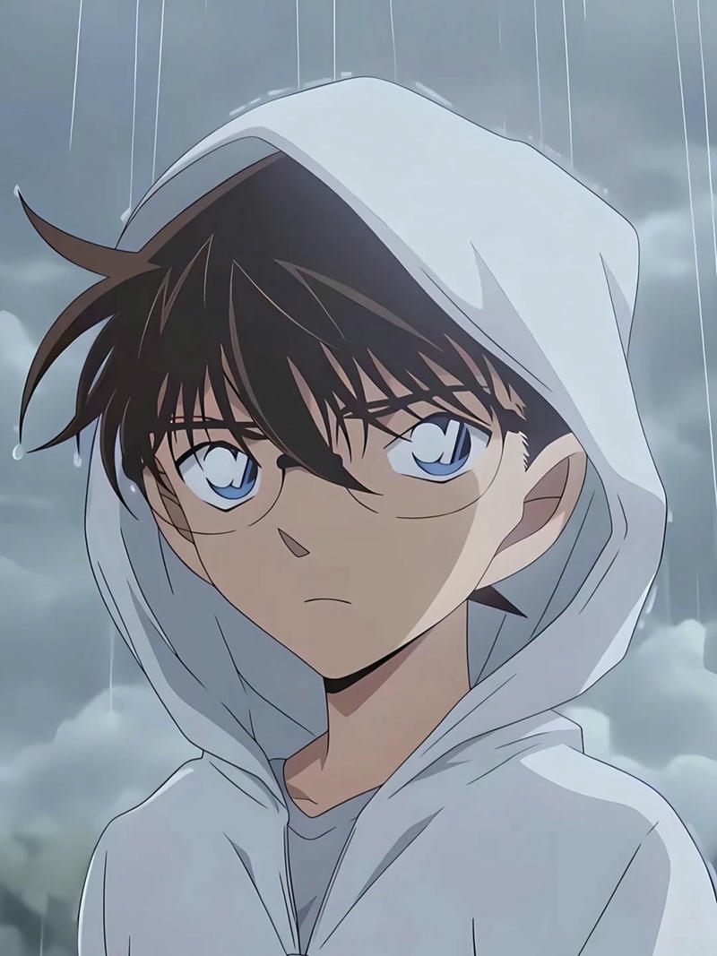 Shinichi mặc áo hoodie trắng trùm đầu dưới trời mưa buồn tâm trạng